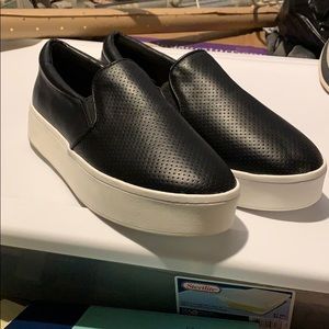 Black platform sneakers